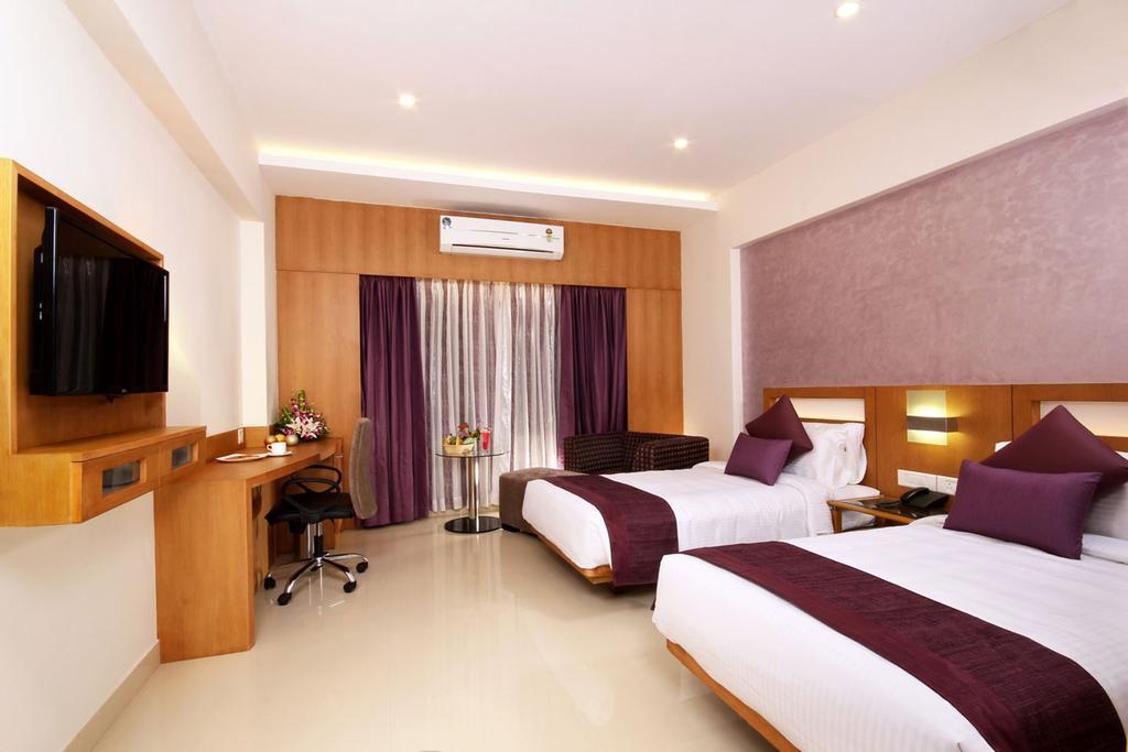 Hotel Chrysoberyl Kottayam Pokoj fotografie