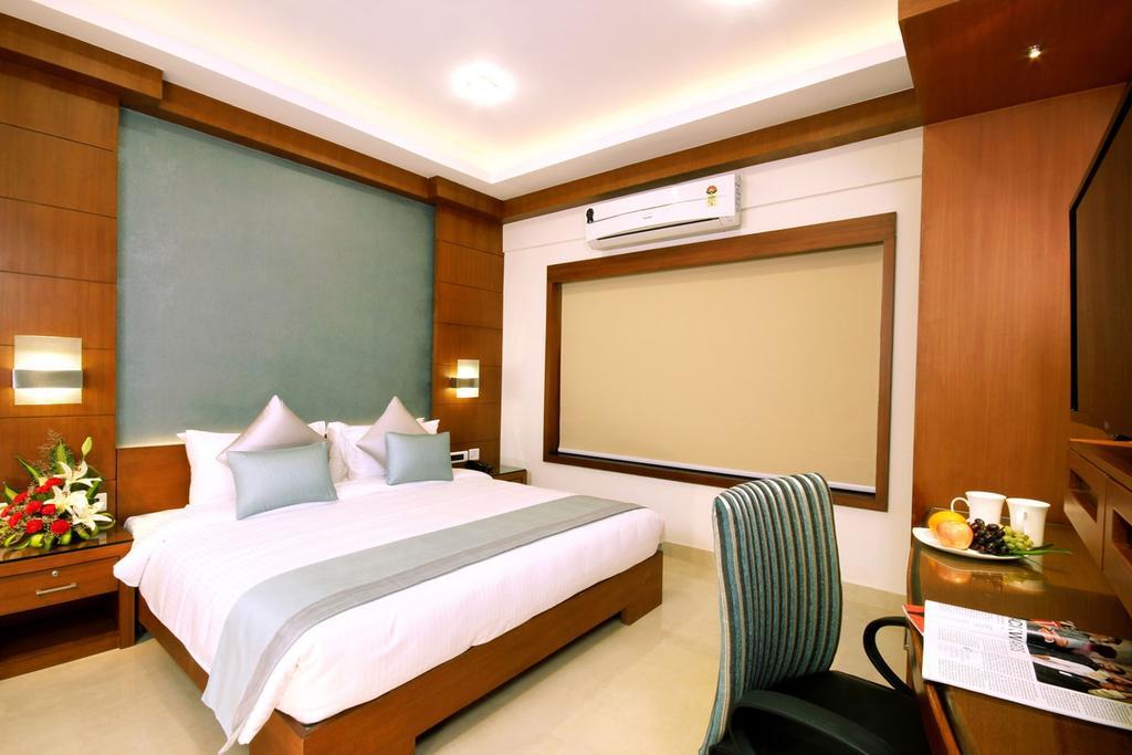 Hotel Chrysoberyl Kottayam Pokoj fotografie